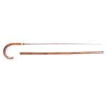 Sword stick, 25½ ins tapered tri-formed blade, cane shaft, brass collar,