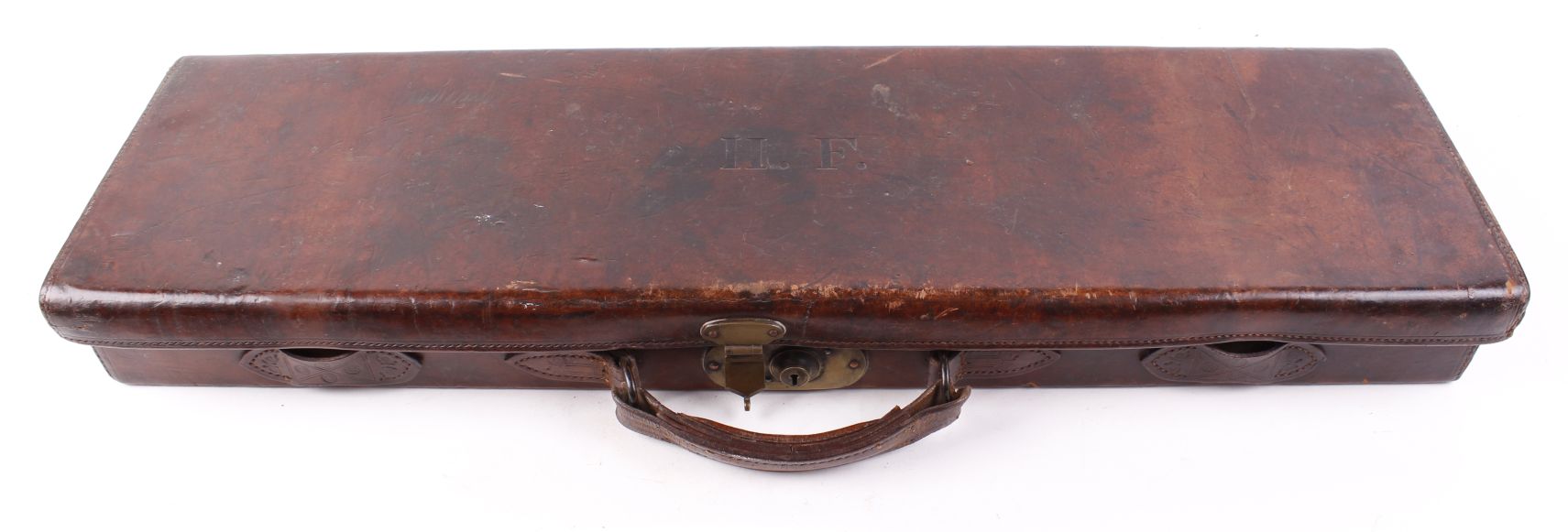 Leather motor case with red baize lined fitted interior for 27½ ins barrels (will take 28 ins),