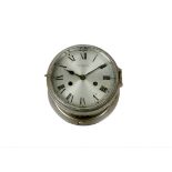 A chromed Watchkeeper bulkhead ship's clock, Roman numeral, 20 cm diameter x 12 cm deep