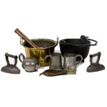 A collection of metalware and other items, including an iron spouted pot with handle, a brass twin-