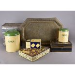 A collection of early 20th Century tins and metalware, including a cash box, Huntley and Palmer