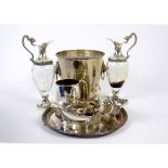 A quantity of silver plate and white metal, including a twin lion mask handled champagne bucket, a