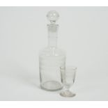 An early 20th Century bachelor's decanter, together with five short stemmed and footed liqueur