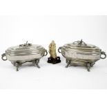 A pair of 19th Century Chinese white metal tureens and covers, dragon handles to tureens and covers,