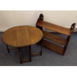 A small mahogany oval spider leg table, turned and squared supports, 66 cm wide x 52 cm deep x 47 cm