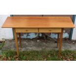 A modern pine console table, two frieze drawers, tapered supports, 122 cm wide x 40 cm deep x 77