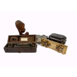 A miscellaneous lot, including a late 19th/early 20th Century cased theodolite by W.F.Stanley, a