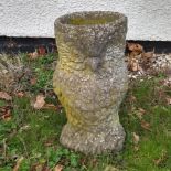 A stone planter in the form of an owl, 50 cm high