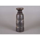 An Afghan wooden tribal flask, cylindrical form, incised decoration and cork stopper, 26.8 cm high