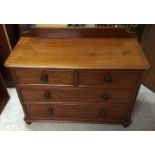 A 19th Century mahogany chest-of-drawers, two short over two long drawers, rounded corners,