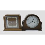 An Art Deco English mantle clock, stepped outline, square dial, Arabic numerals, three train