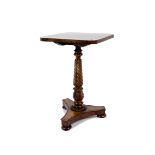 A William IV rosewood tilt-top occasional table, square top, turned and tulip carved column, triform