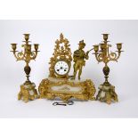 A mid 20th Century French cast metal and alabaster clock garniture, eight day movement, circular