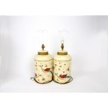 A pair of Woolpit Interiors of Suffolk lamp bases, both tea canisters hand painted with a scene of a