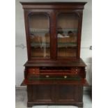 A 19th Century mahogany secretaire bookcase, upper section with two panel glazed doors and