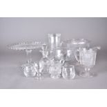 A collection of 19th Century and later colourless moulded and cut glass including a footed cake