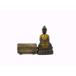 Chinese metal figure of a Buddha, seated in dhyanasana with his hands clasped in a gesture of