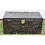 An Asian camphor wood chest with hinged lid, 102 cm wide x 50 cm deep x 48 cm high. Together with