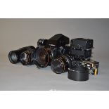 A Bronica SQ-Am Roll Film SLR Camera Outfit, including body, prism viewfinder, 120 film back,