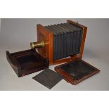 A 12" x 10" Mahogany & Brass Plate Camera, fixed back, bellows, moveable front and lens board,