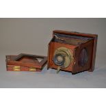 A Shew Mahogany 3¼x4¼ Folding Plate Camera, made in London, possibly an Eclipse model circa 1890,