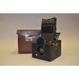 An Ensign Focal Plane Roll Film Reflex Camera, body F-G, with Aldis Butcher 4" f/3.4 Anastigmat