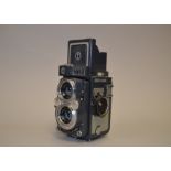 A Yashica 44 LM Roll Film TLR Camera, 4 x 4cm format on 127 roll film, Yashinon 60mm f/3.5 lenses,