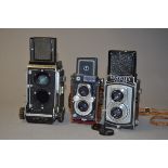 A Mamiya C3 Professional TLR Body, with waist level finder and screen, focus rack good, body