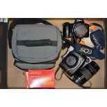 A Canon EOS 1000F SLR Camera and Lenses, serial no 3334651, shutter working, with a Canon EF 35-