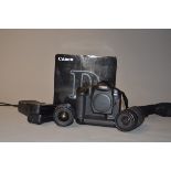 A Canon EOS-1D DSLR Camera and Lenses, serial no 020025, body G, slight wear around flash shoe and