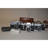 A Zenit 3M and Minolta 16 II Cameras, a Zenit 3M SLR camera, serial no 63040455, shutter working,
