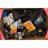 A Tray of Cameras and Accessories, including a Polaroid Sun 600 LMS camera, a Panasonic Lumix DMC-