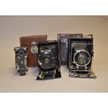 A Group of Three Folding Cameras, a Wallace Heaton New Universal Zodel 6.5 x 9cm folding-bed plate