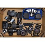 A Group of Olympus, Pentax and Praktica SLR Cameras, including Olympus OM101 cameras (2), a Pentax