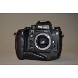 A Nikon F4s SLR Body, serial no 2290163, with finder DP-20, battery pack MB-21, condition P, both