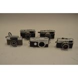 A Group of Olympus 35mm Cameras, including Pen FT half frame SLR body, Pen-EE half frame camera,