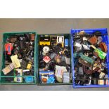A Large Quantity of Photographic Accessories, including flash brackets, flash guns,