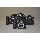 Four Nikon DSLR Bodies, D70s (three examples, one ENEL3 battery), serial no 8013026, 8014403,