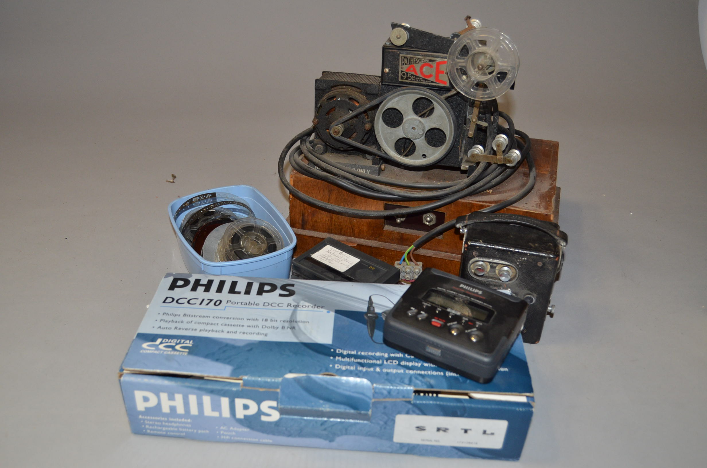 A Pathescope Ace 9.5mm Cine Projector, with motor, untested, together with a quantity of 9.5mm film,