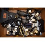 A Group of Modern Canon SLR Cameras, including EOS 66, EOS 100, EOS 300 camera, EOS 300V, Minolta