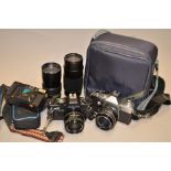 Two Praktica SLR Cameras and a Group of M42 Lenses, a Praktica MTL3 with a Carenar 35mm f/2.8