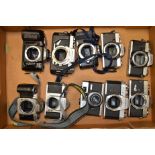 A Tray of Japanese SLR Cameras, including Asahi Pentax, Minolta, Nikon and Yashica plus a Dacora