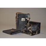 A Rietzschel's Heli-Clack 3¼"x 4¼" Folding Plate Camera, black, with Doppel Anastigmat 135mm f/6.8