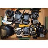 A Tray of Nikon and Minolta SLR Bodies, including Minolta Dynax 7000i (2 examples with lenses),