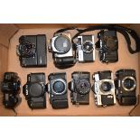 A Tray of Konica and Other SLR Bodies and Cameras, including Konica Autoreflex T body and TC camera,