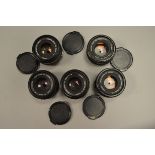 A Group of Canon FD Standard Lenses, including 50mm f/1.8 New FD (3 examples), 50mm f/2 (2