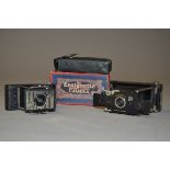 A Houghtons Ensignette No 1 Folding Camera, 1911-15 model with maker's case and box, together with a