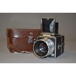 A Zenith 80 6 x 6cm SLR Camera serial no 6804227, shutter working, body G, with Vitoflex 80mm f/2.