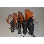 Four Binoculars, a A.M. 6E/293 binoculars, a Delacroix 10 x35 binoculars, a Magnus 10 x 35