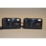 A Pair of Yashica T 35mm Compact Cameras, a Yashica T4 and T5 both black with Carl Zeiss Tessar 35mm